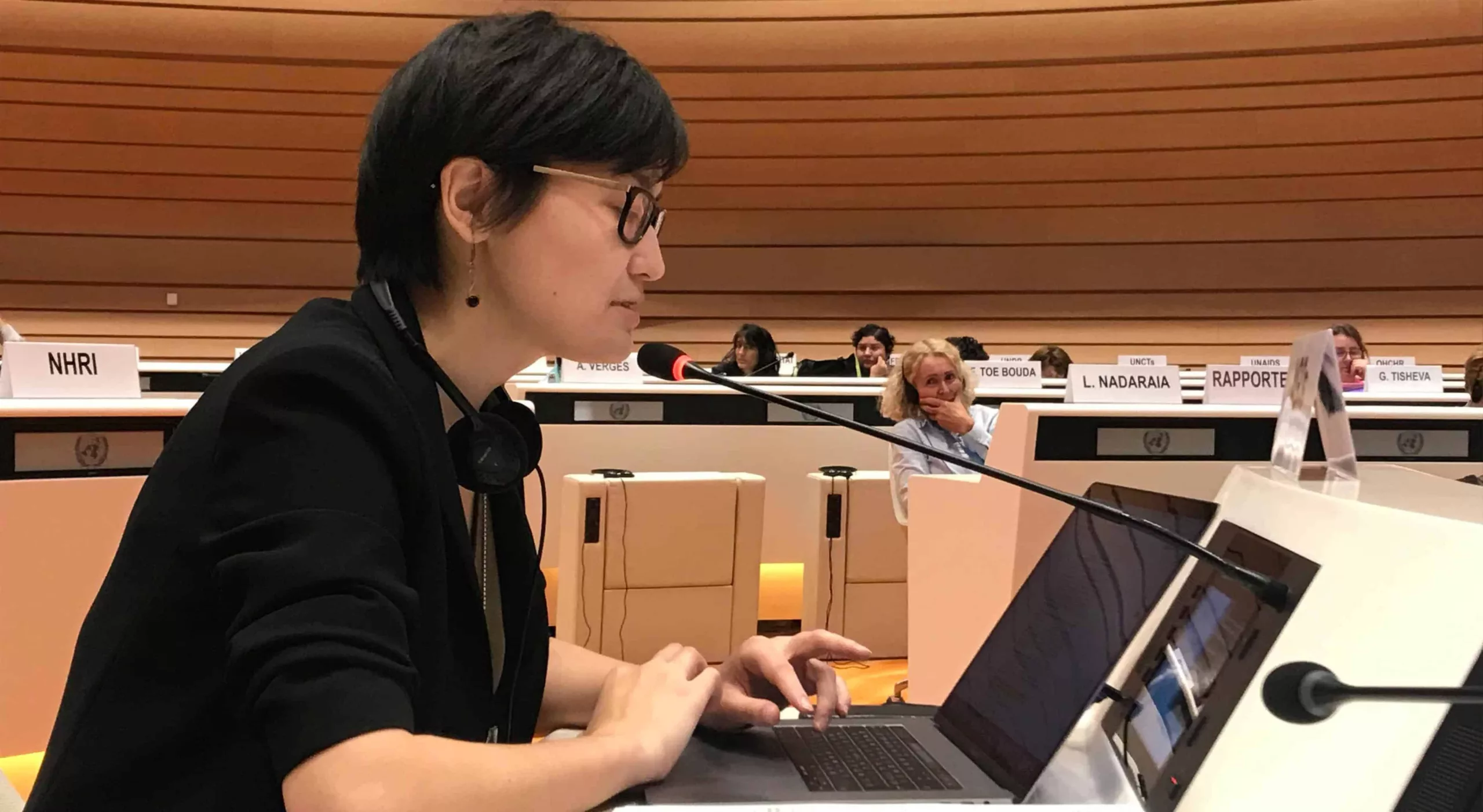 Aigerim Kamidola Woman speaking at UN briefing
