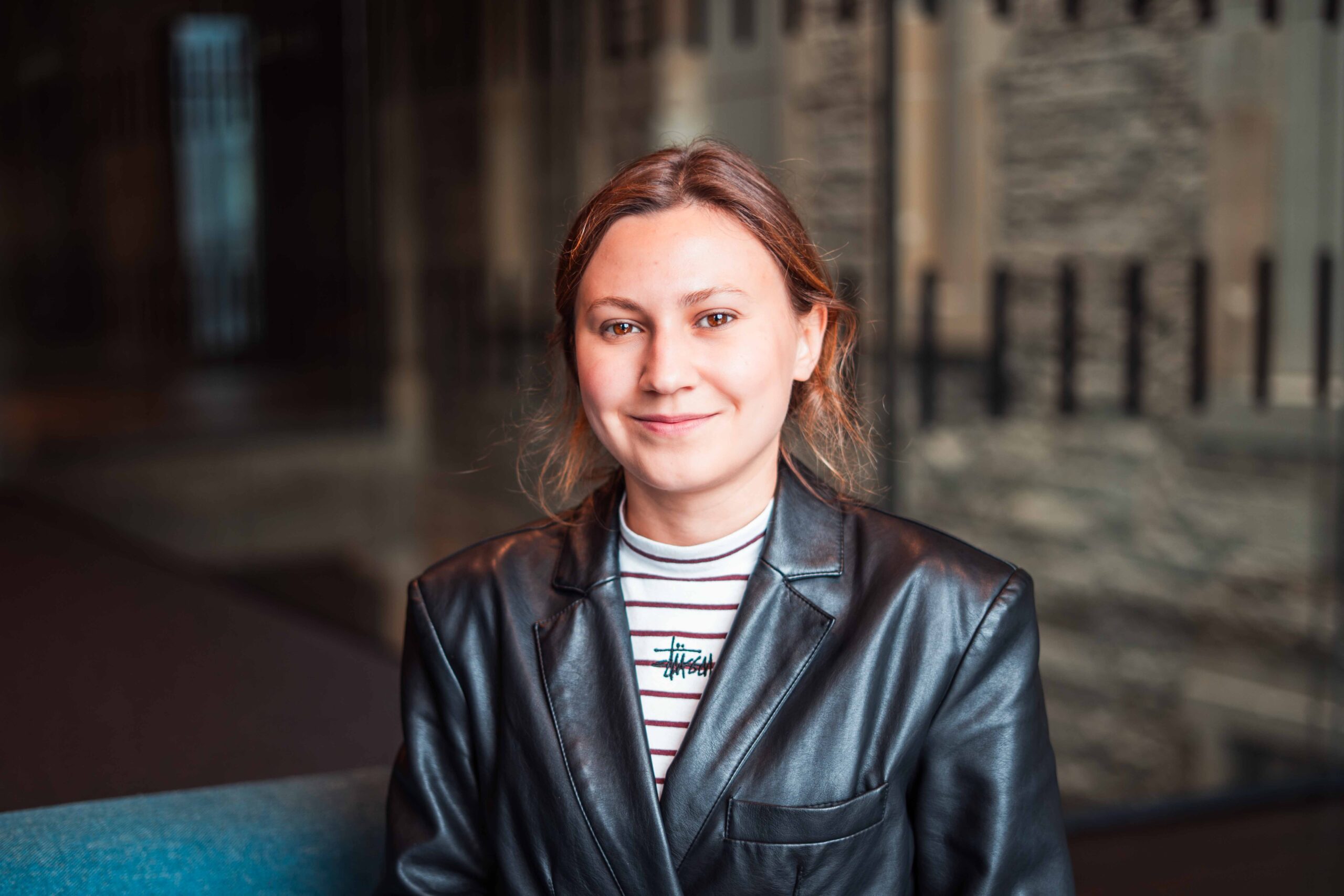 Ukrainian Women's Leadership Programme Young woman in a striped top and leather jacket
