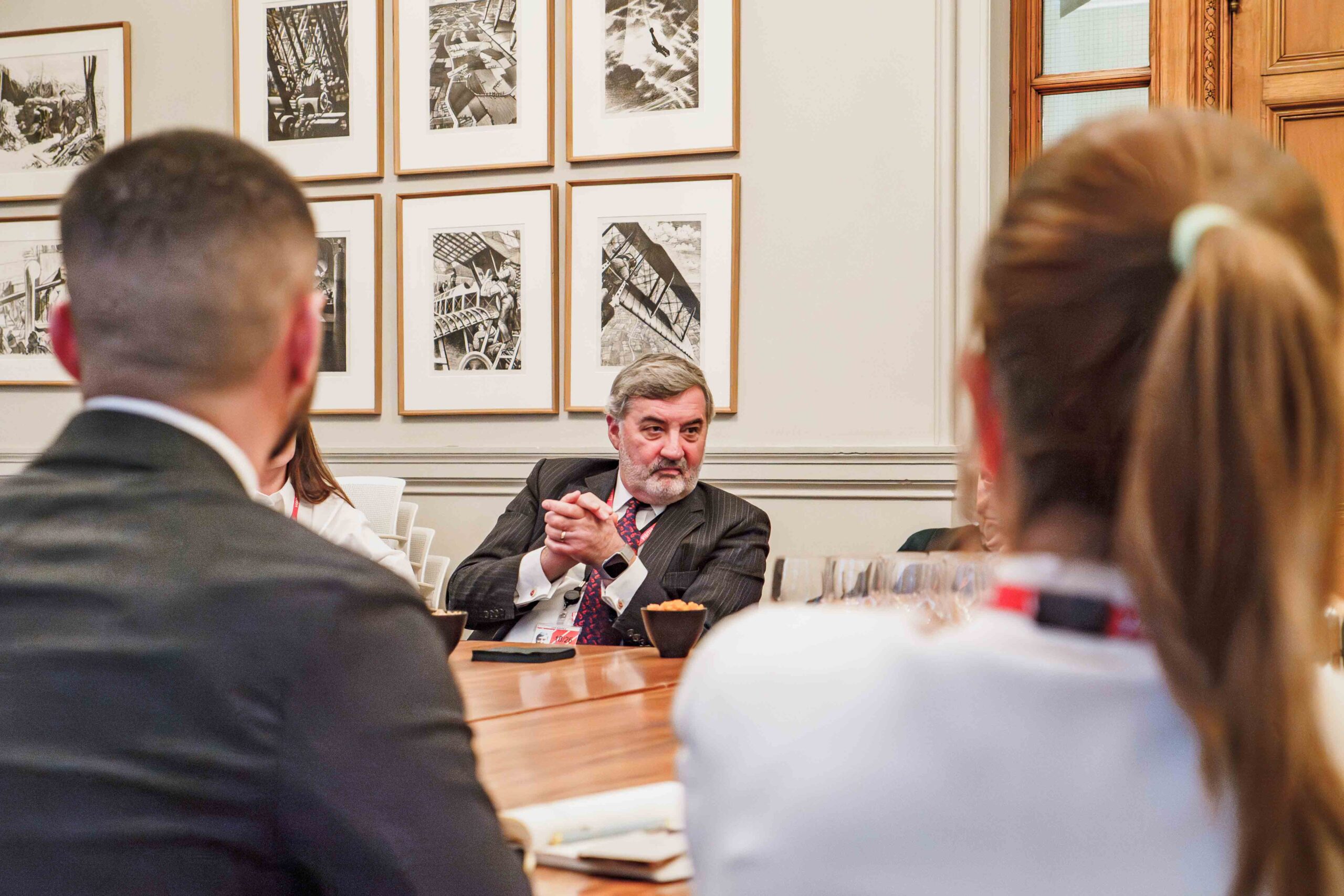 John Alderdice People sitting around a table in a board room
