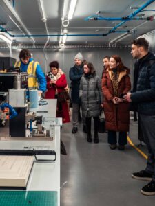 People being shown around inside a hydrogen facility