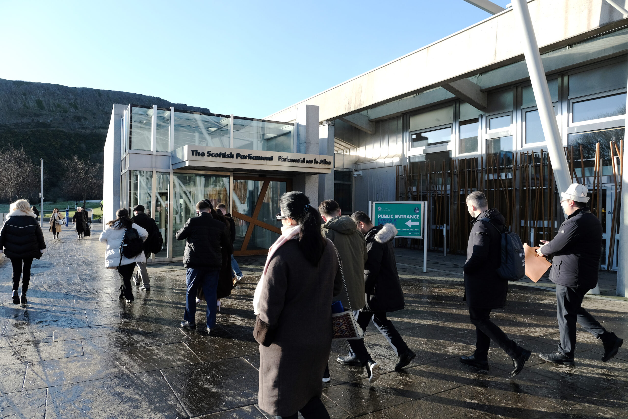 Fellows walkiing into Scottish Parliament Fellows walkiing into Scottish Parliament